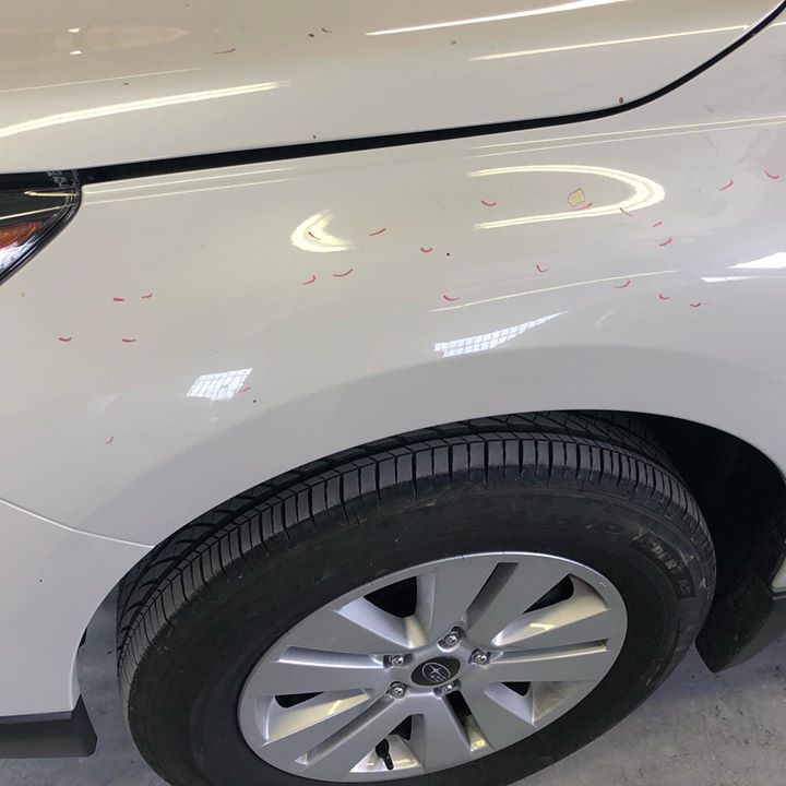 Hail car. The red marks indicate hail  that’s just a fraction of the damage.  The roof has hundreds of ding. And you can see what we have to do to access the damage.  @ Baker Paint &amp; Body Shop